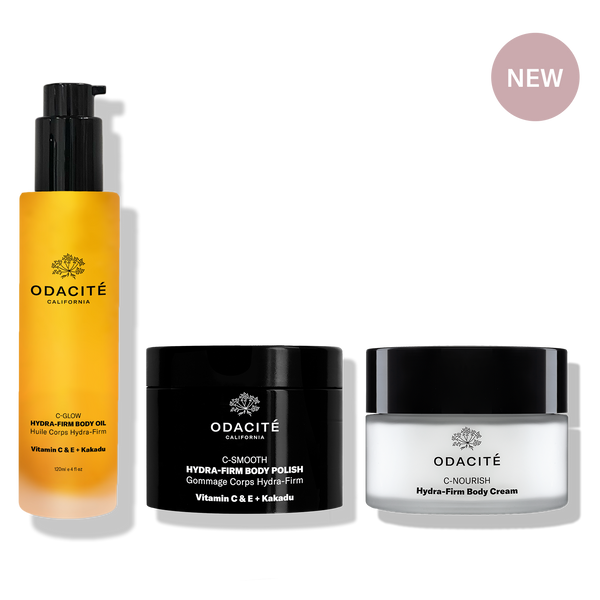 Odacité Hydra-Firm Full Body Routine set with oil, polish, and cream; packaging displays “NEW” label.