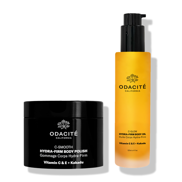 Odacité Hydra-Firm Full Body Duo set with C-Glow and C-Smooth, Vitamin C+ Kakadu Plum, two bottles in white and gold packaging.