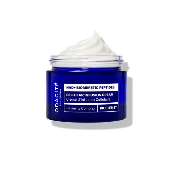 Odacité Cellular Infusion Cream NAD+ Biomimetic Peptides, open jar with white cream visible, on a white background.