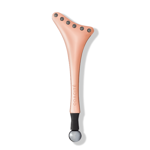 Odacité Cryo-Tech Facial Tool with Terahertz-powered metal nodes and a black ball handle for facial massage.