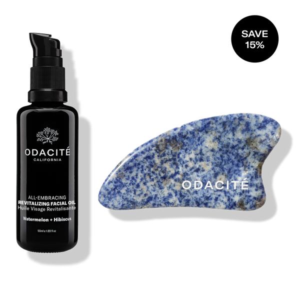 Odacité Gua Sha Facial Massage Set with black facial oil bottle and blue marbled gua sha tool, SAVE 15% in black circle.