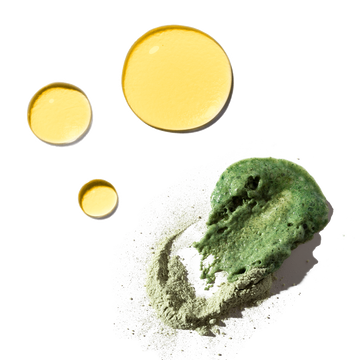 Three golden drops of Safflower Oil cleanser and green matcha exfoliating paste from the Odacité Uneven Skin Double Cleansing Set.