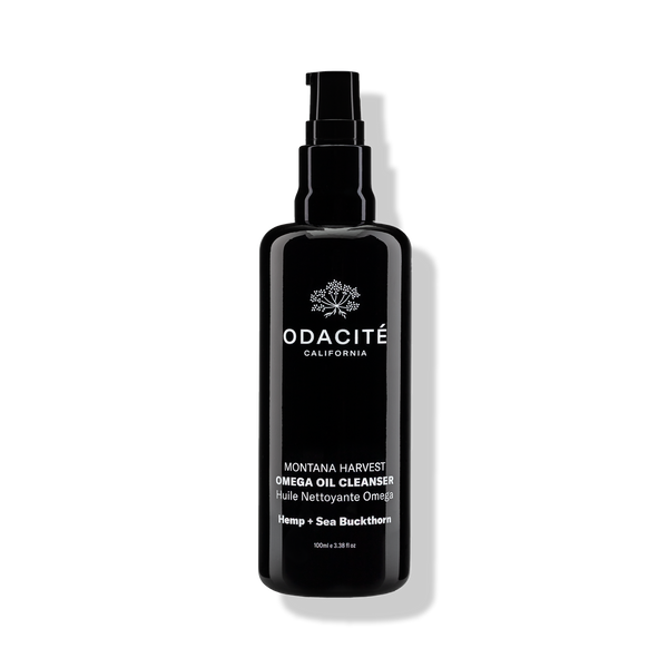 Black Odacité Montana Harvest • Hemp + Sea Buckthorn Omega Oil Cleanser bottle with pump, set against a white background.
