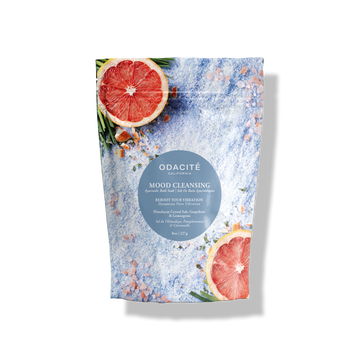 Odacite Mood Cleansing Ayurvedic Bath Soak with Himalayan crystal salt, grapefruit, and lemongrass in blue packaging.