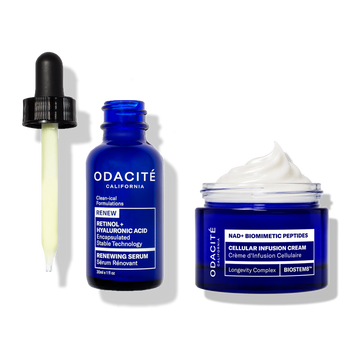 Odacité Cellular Renewal Duo: a blue glass retinol serum bottle with a dropper and a blue jar containing a dollop of white cream.
