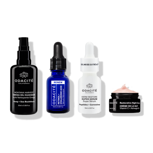 Four Odacité Age-Defying Fundamentals with Vitamin C: cleanser, serum, super serum, and night cream on a white background.