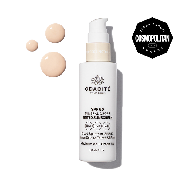 Odacité SPF 50 Tinted Mineral Drops bottle with label showing Niacinamide and Green Tea, offering tinted mineral sunscreen.