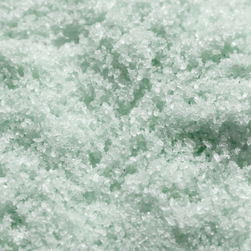 Coarse, pale green texture of Zen Awakening Himalayan Crystal Salt, Rosemary & Eucalyptus Ayurvedic Bath Soak.