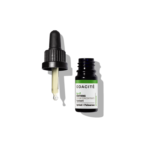 Green Odacite Soothing Apricot + Palmarosa Ap+P Serum Concentrate bottle for sensitive skin on a white background.