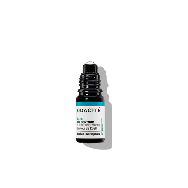 Odacite Ba+S Eye Contour Rollerball with baobab and sarsaparilla serum shown in a small, metal-tipped tube.