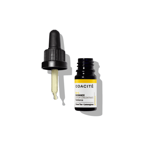 Odacite Radiance Green Tea + Lemongrass Gt+L Serum Concentrate bottle with dropper cap off on a white surface.
