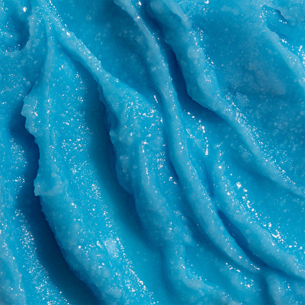 Odacite le Blue Balm in a jar, blue-tinted with visible ridges, showing thick texture; chamomile and shea butter noted on label.