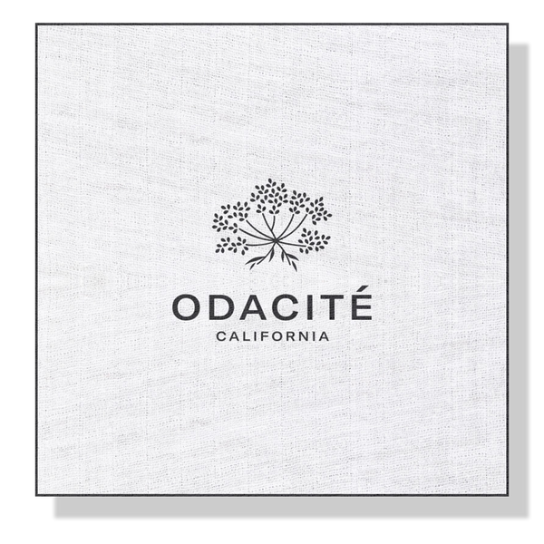 Odacité tree logo above “Odacité CALIFORNIA” on a white textured background, shown with the Odacité Muslin Cloth.